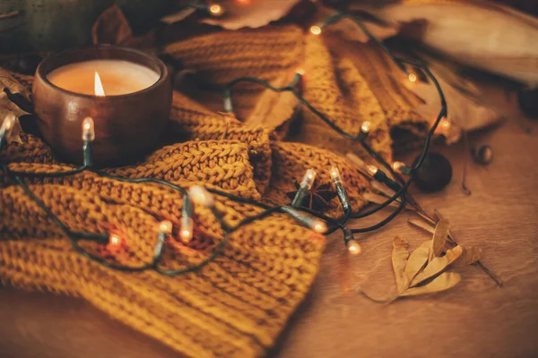 Autumn Leaves Spices Candle Cozy Knitted Sweater Warm Yellow Lights — Stock Photo, Image