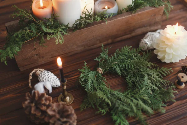 Rustic Christmas Wreath Candles Pine Cones Thread Ornaments Wooden Table — Stock Photo, Image