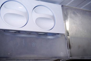 Ice dispenser in the fridge clipart