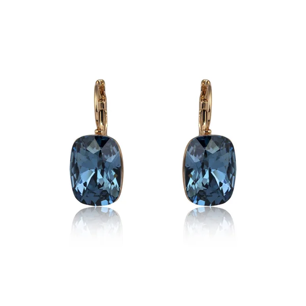 Pair of sapphire earrings isolated on white background