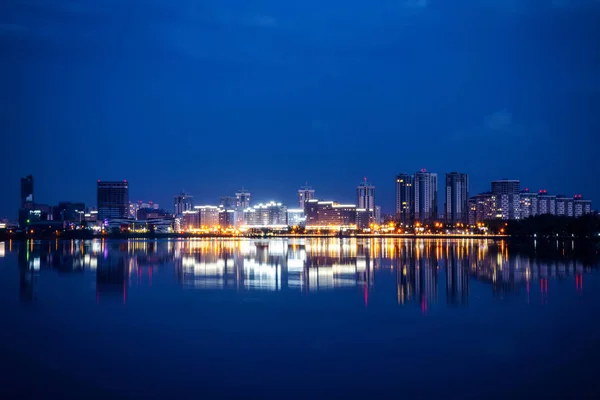 Cityscape of modern city at night — Stock Photo, Image