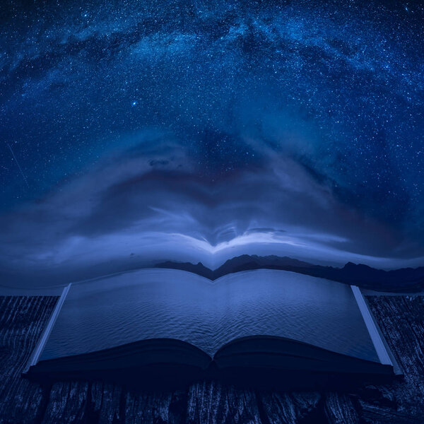 Milky way in a night starry sky above the sea on the pages of an open magical book. Majestic nature. Travel concept.