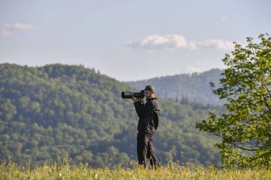 doğa fotoğrafçısı alarak fotoğraf