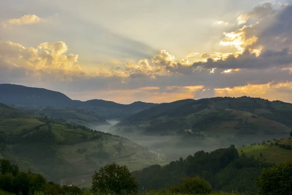 Beautiful from the nature with fog and clouds at sunset