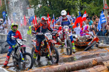 SIBIU, ROMANIA - JULY 28: Unknown competitor in Red Bull ROMANIACS Hard Enduro Rally . The hardest enduro rally in the world. 24th to 28th  July 2018 in Sibiu, Romania clipart