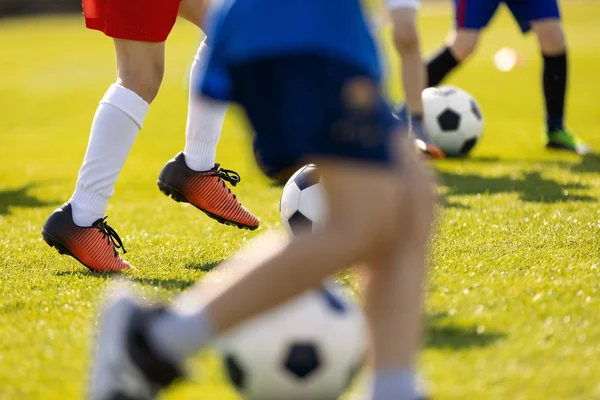 stock image Children Soccer Training Background. Running Youth Football Players. Footballers Kicking Football Match. Soccer School Tournament. Young Soccer Players Running After the Ball