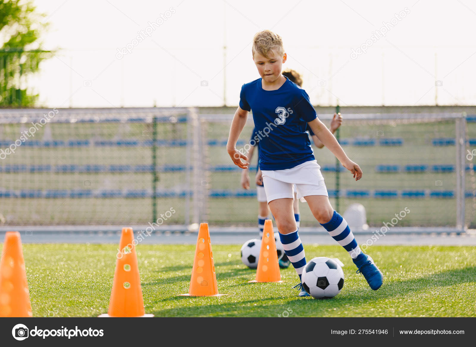 Soccer Camp For Kids Boys Practice Dribbling In A Field Players Develop Good Soccer Dribbling Skills Children Training With Balls And Cones Soccer Slalom Drills To Improve Football Dribbling Pace Stock Photo Soccer Camp For Kids Boys Practice Dribbling In A Field Players Develop Good Soccer Dribbling Skills Children Training With Balls And Cones Soccer Slalom Drills To Improve Football Dribbling Pace Stock Photo