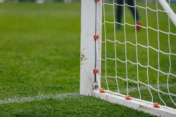 Football soccer goal. Post of football goal and white net in the foreground — Stock Photo, Image
