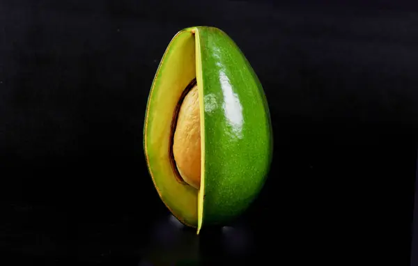 Sliced Avocado Isolated Black Background — Stock Photo, Image