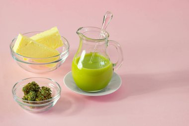 Making Cannabutter for Baking Edibles with Butter and Cannabis or Hemp on Pink Background with Copy Space clipart