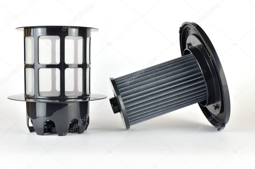 Box and filter of a new vacuum cleaner - on a white background