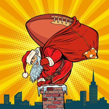 Amerikan futbolu topu. Noel Baba hediye ile c tırmanıyor