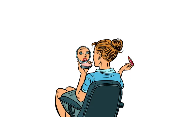 Pop art woman looks in the hand mirror and paints her lips — Stock Vector