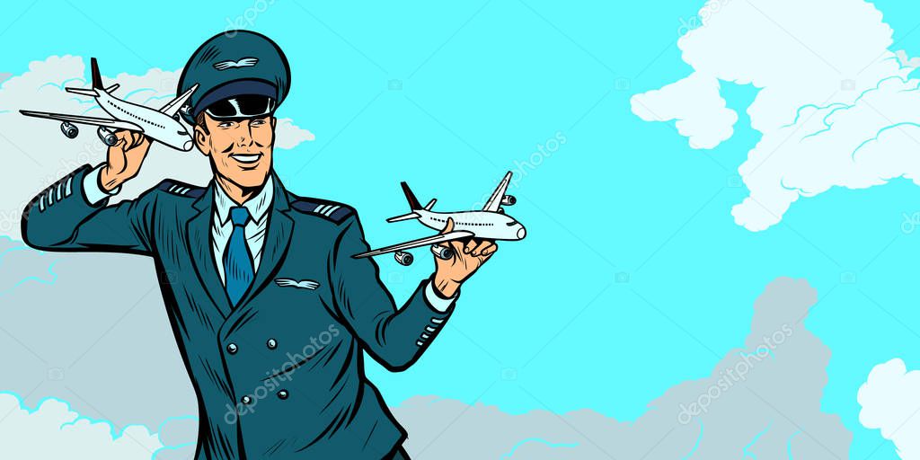 male airplane pilot. Model aircraft in hand