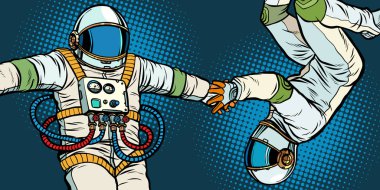 bir çift aşık, el ele tutuşarak astronotlar