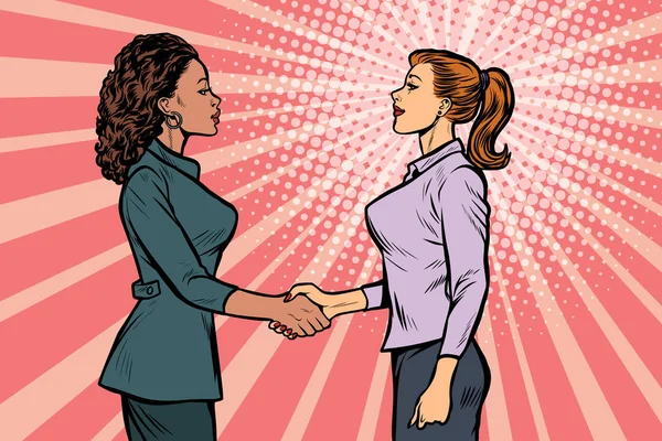 Две деловые женщины пожимают руки — стоковый вектор