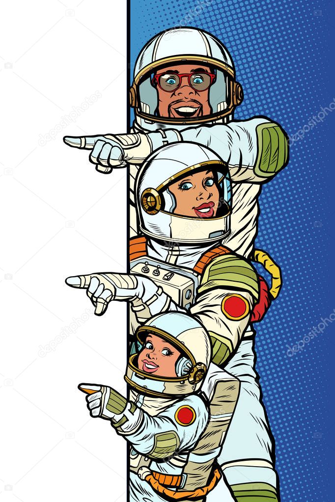 multi race family astronauts mom dad and son. Point to copy space poster