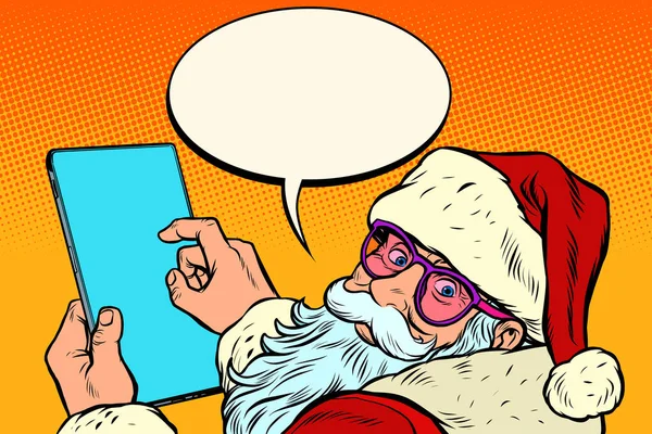 Santa Claus con una tableta. Feliz Navidad y feliz año nuevo — Vector de stock