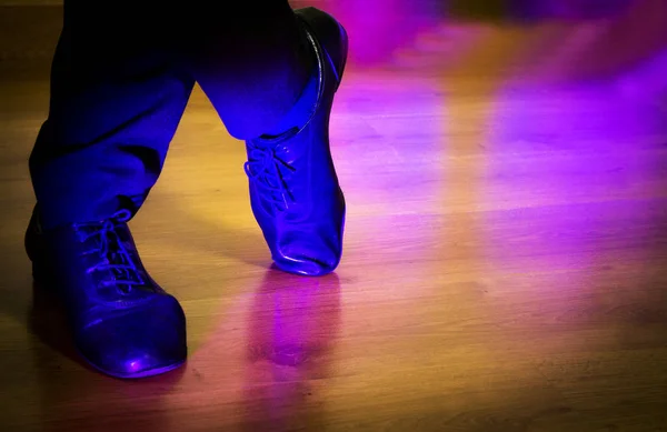 Feet dancer dancing salsa. Copy space