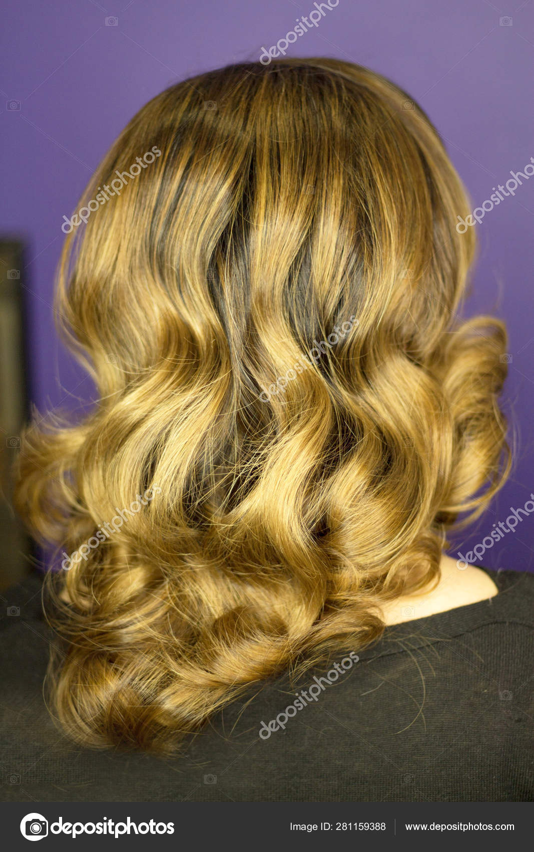 Portrait Of Woman With Brown Hair And Waves 40s Stock Photo
