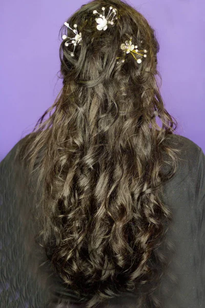 Middleaged woman with long brown hair and curly — Stock Photo, Image