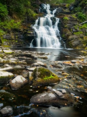 Waterfall White Bridges. Summer landscape. Wild nature