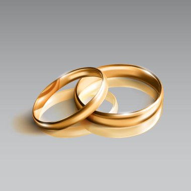 Gri arka planda Izole gerçekçi parlak altın yüzükler