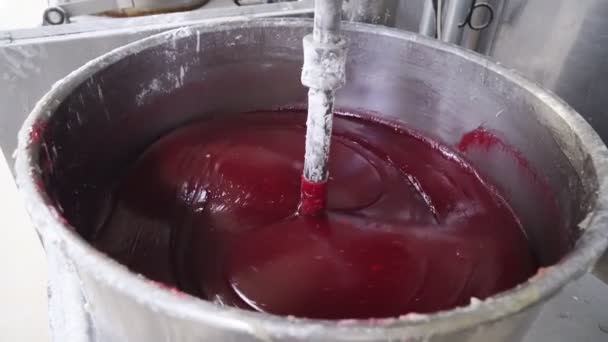 Knead red mass for marshmallow or jam. confectionery factory sweets production — Stock Video