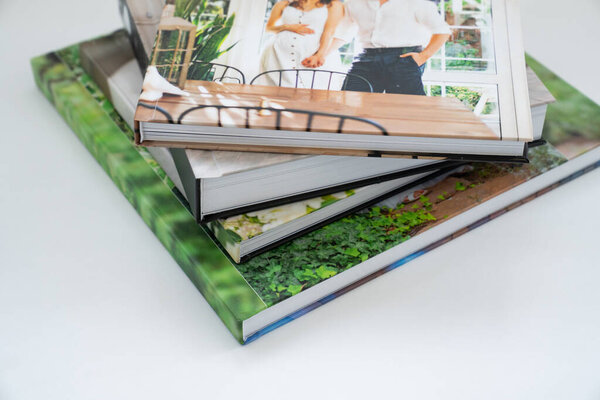 a stack of photobooks. beautiful, convenient and long-lasting photo storage. 