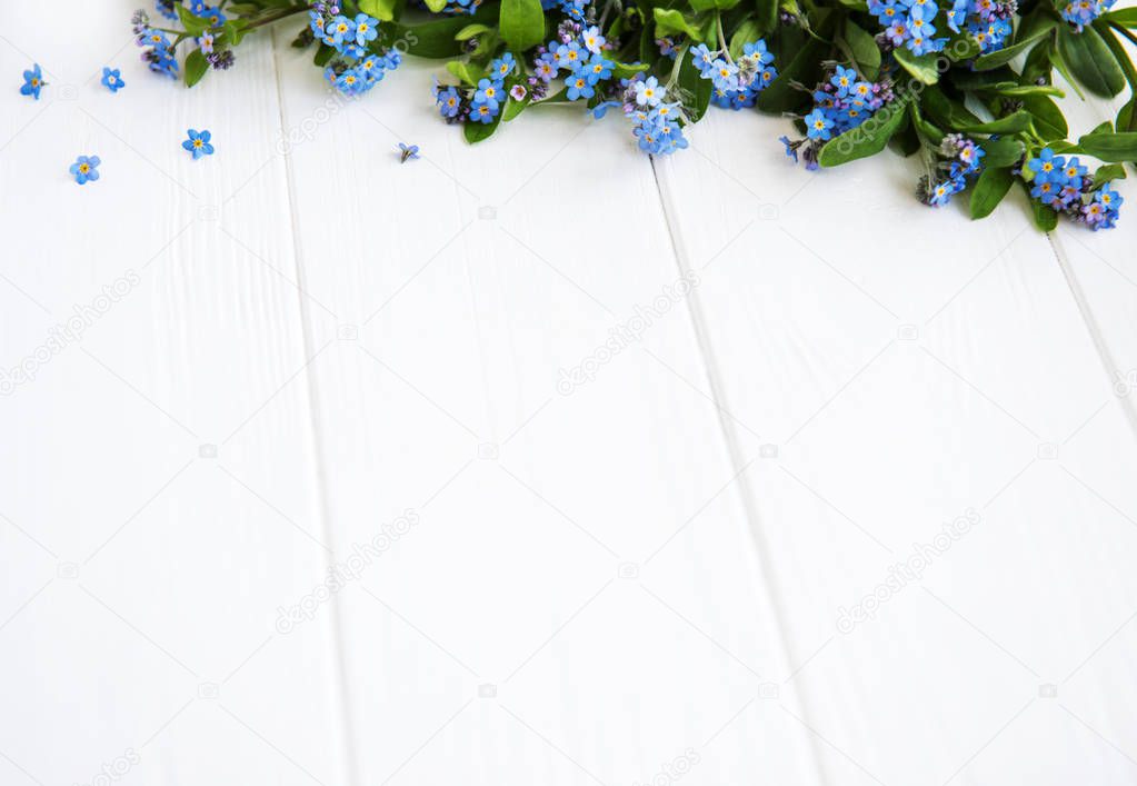 Forget-me-nots flowers  on a white  wooden background