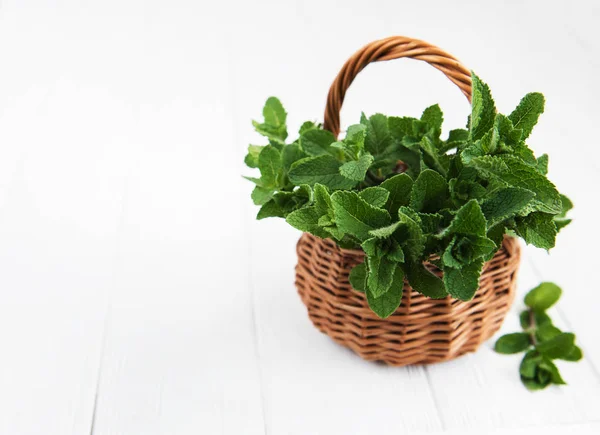 Basket Mint White Wooden Background — Stock Photo, Image