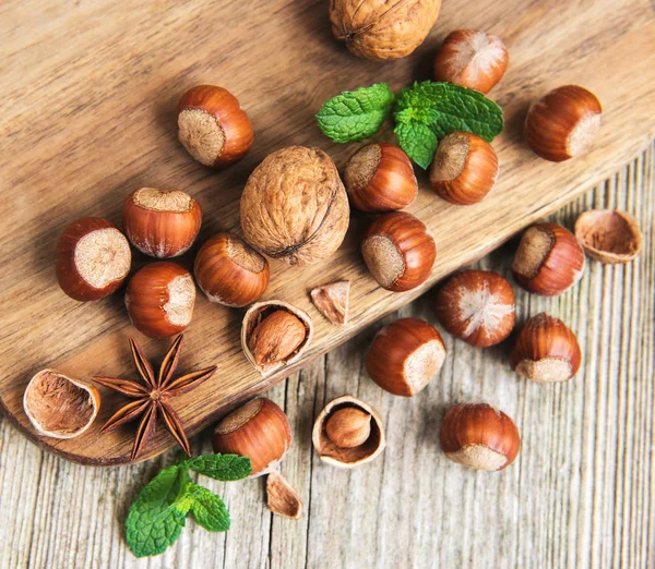 Wooden Board Hazelnuts Old Wooden Table — Stock Photo, Image