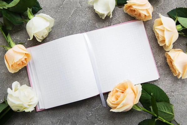 Roses Notebook Concrete Background — Stock Photo, Image