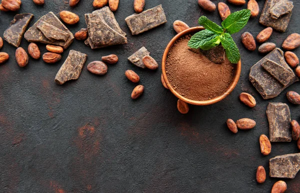 Cocoa powder and beans — Stock Photo, Image