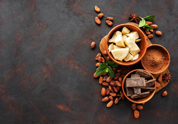 Cocoa beans, butter and chocolate — Stock Photo, Image