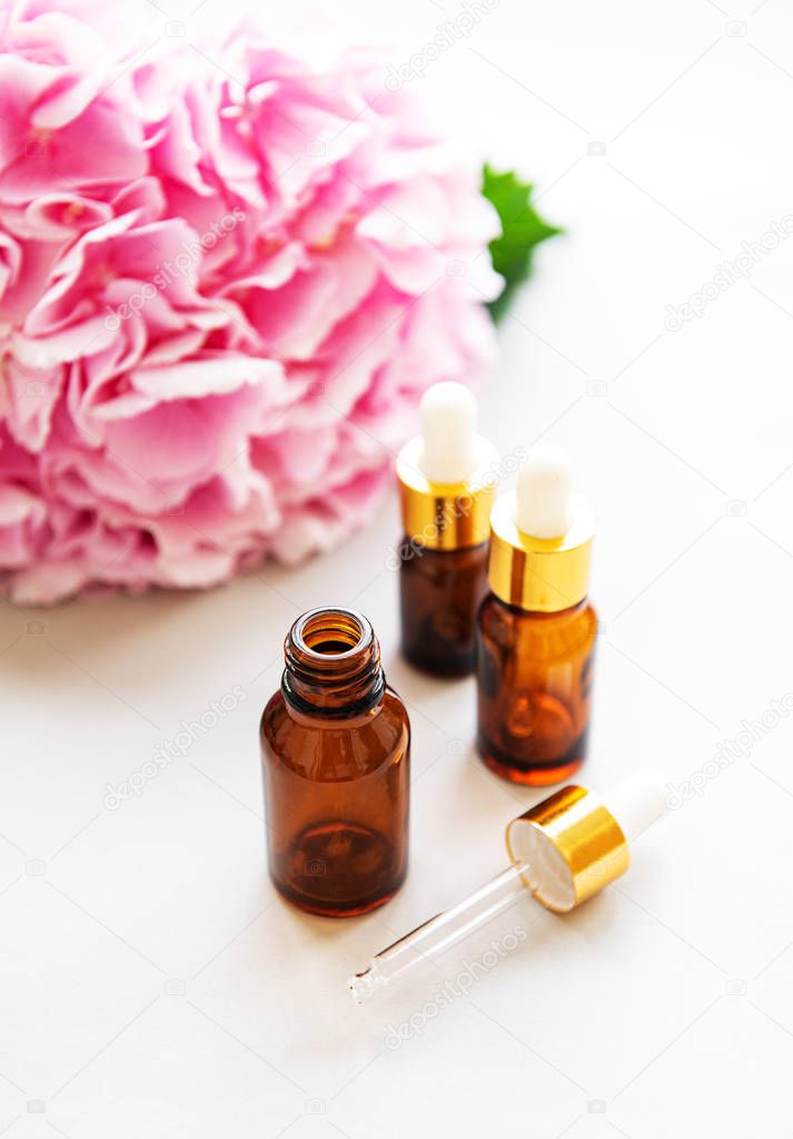 Pink hydrangea and massage oil