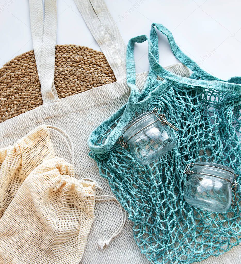 Cotton bags, net bag with reusable  glass jars. Zero waste concept. Eco friendly. Flat lay