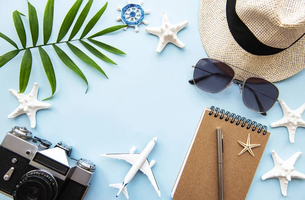 Overhead view of Traveler's accessories. Essential vacation items. Travel concept background. Flat lay