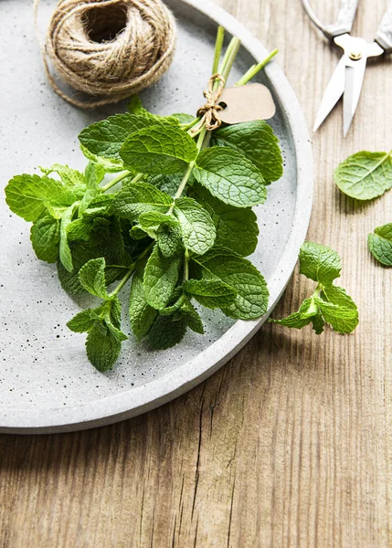 Fresh Green Mint Leaves Plate Old Wooden Table — Stock Photo, Image