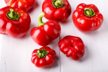 Pepper ratunda ( gogoshar ). Tomato shaped sweet pepper on white. Red bell pepper, capsicum or sweet pepper. clipart