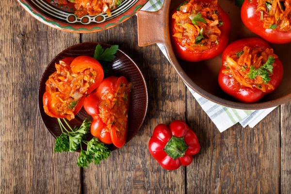 Sweet pepper stuffed with vegetables. Tomato shaped pepper ratunda ( gogoshar ). Top view.