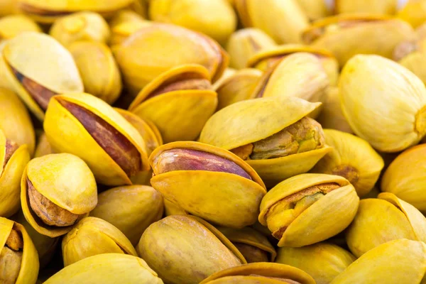 Pistachenoten Gele Schelpen Geroosterd Met Saffraan Voedsel Achtergrond — Stockfoto