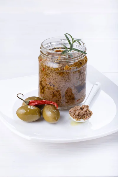 Tapenade, spicy olive paste made from green olives and red hot chilli pepper — Stock Photo, Image