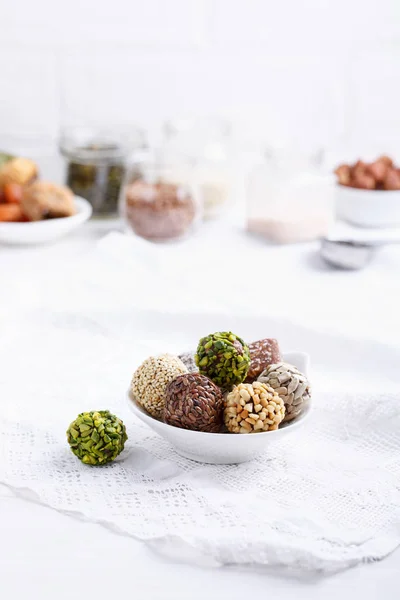 Healthy energy balls made of dried fruits and nuts with coconut — Stock Photo, Image