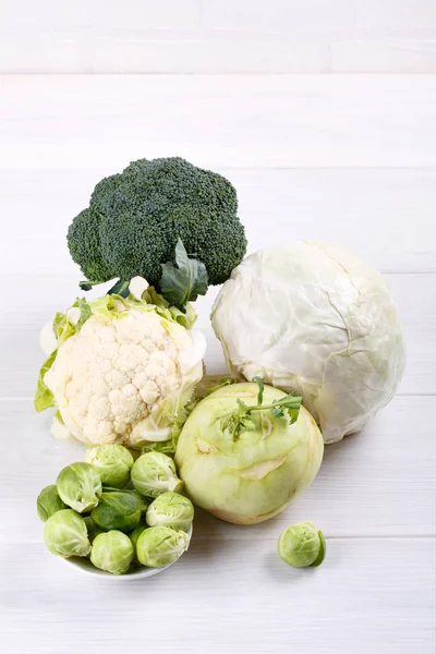 Assortment cabbages - romanesco, white cabbage, broccoli, caulif — Stock Image Assortment cabbages - romanesco, white cabbage, broccoli, caulif Stock Photo