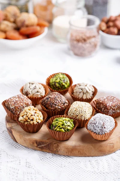 Healthy energy balls made of dried fruits and nuts with coconut