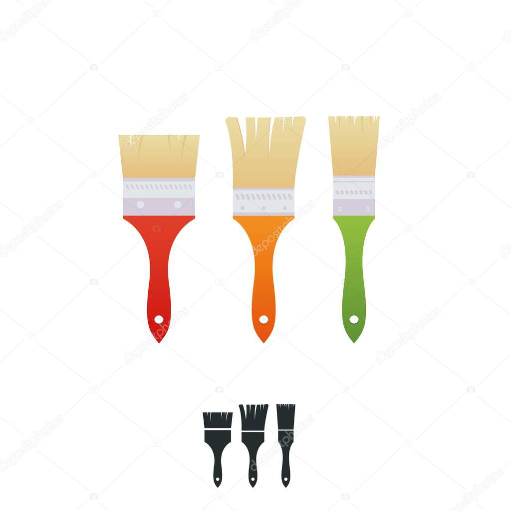 A house painter and decorator brushes with colorful handles. Three paintbrushes isolated on white. Clean unused paint brushes.