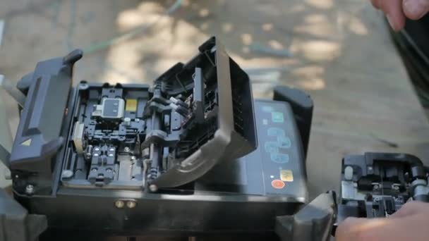 Technicians are installing optic fiber with cable ties. — Stock Footage Technicians are installing optic fiber with cable ties. Video Clip