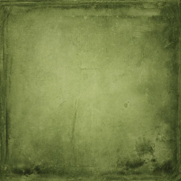 Green vintage background,paper,retro,grunge,spots,streaks,blank