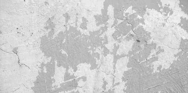 Texture of grey concrete wall, grey concrete background, cement, paint streaks, grunge, primer, construction and architecture,Grey concrete wall for internal or external surface. Construction and architecture.Cement has sand and stone